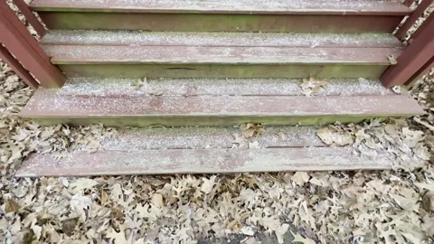 Snow flurries on steps Stock Footage 168778028