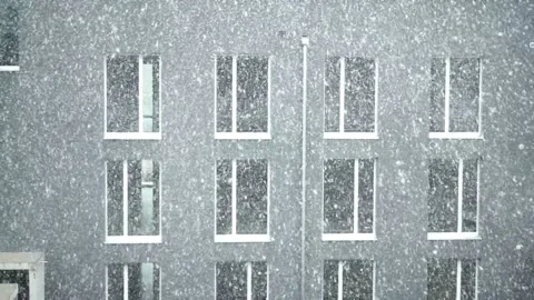 Snow Flurry Over Building Stock Footage 156522929
