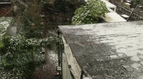 Snow in garden- looking down Stock Footage 22302703