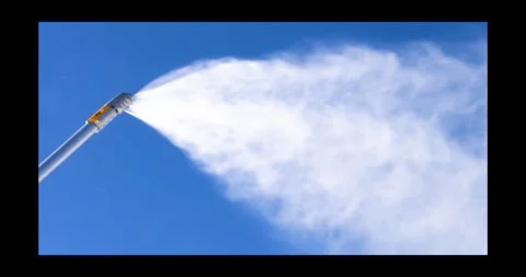 Snow generation on snowy slope background of blue sky. High ski season Stock Footage 302457324