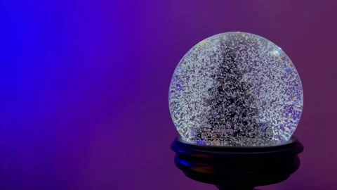 Snow Globe with Blue Purple Backdrop Stock Footage 144967769
