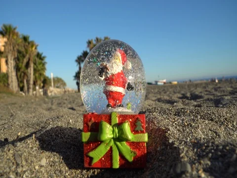 Snow globe on the sea beach Stock Footage 82703175