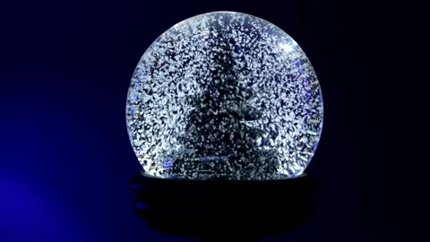 Snow Globe with Tree Starting Up Stock Footage 144968259