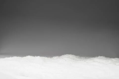 Snow on gray background Stock Photos