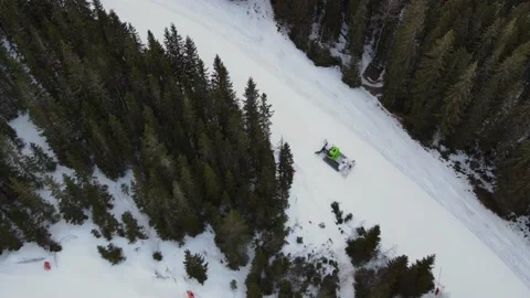 Snow groomer preparing the snow on a ski slope Video stock 164476953