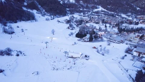 Snow Grooming Machine Preparing Ski Slopes at Dawn, Serre Chevalier Resort Video stock 329560780