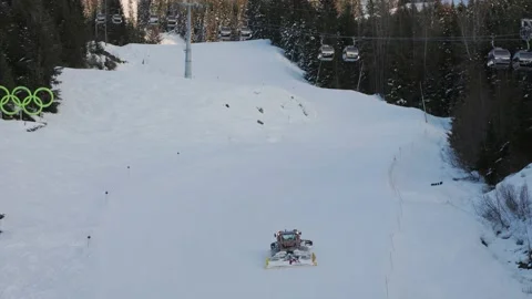 Snow grooming machine, snow maker, mountain sunset, snow, high alpine, snowy Stock Footage 238613975