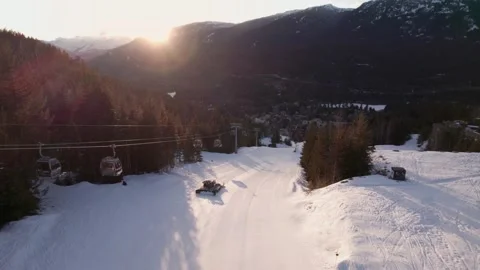 Snow grooming machine, snow maker, mountain sunset, snow, high alpine, snowy Stock Footage 238614264