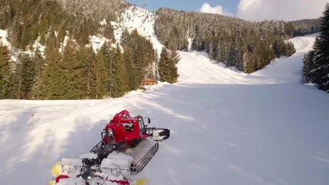 Snow grooming machine, snow maker, mountain sunset, snow, high alpine, snowy Stock Footage 238614540