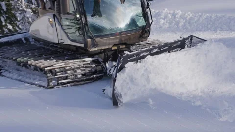 Snow grooming on a ski slope Stock Footage 285396595