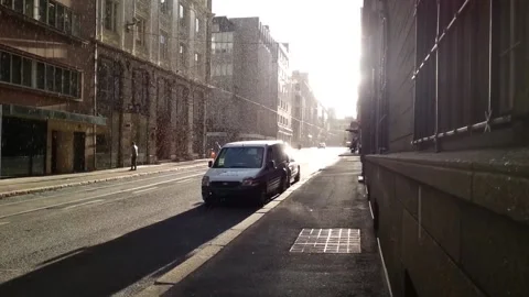 Snow &amp; Hail Start to Fall in Sunlight on a Street in Oslo Norway Video stock 143999764