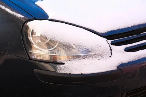 Snow on the headlight Stock Photos