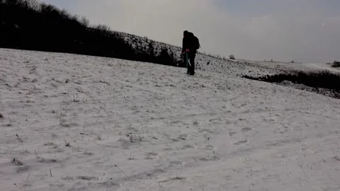 Snow Hiking In Blizzard Man 스톡 동영상 220736317
