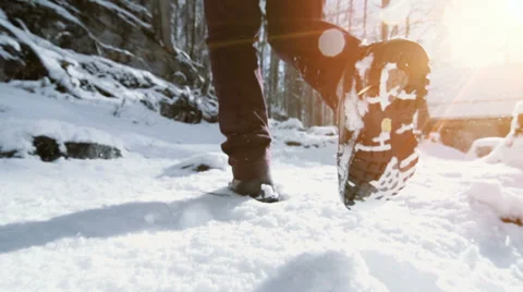 Snow hiking walking. foot steps feet. slow motion. Stock Footage