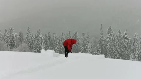 Snow igloo building in the high winter mountains Video stock 157830761