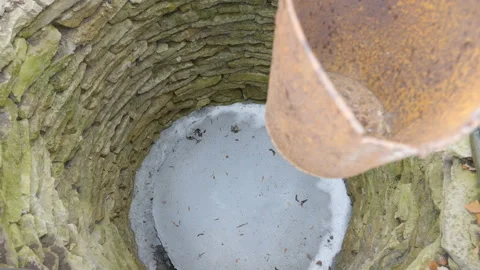 The snow inside the deep well in the yard Stock Footage 152689618