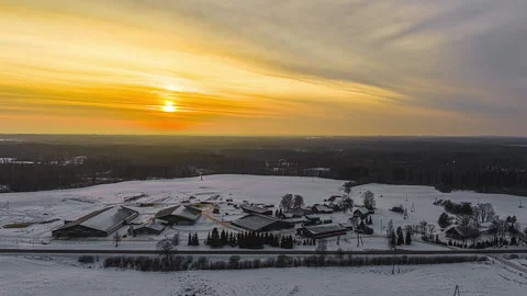 Snow landscape with river under low sun aerial 库存影片 334693607