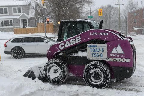 Snow Loader in Action Stock Photos