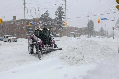Snow Loader in Action Stock Photos