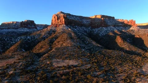 Snow lying on red cliffs at Colorado National Monument Video stock 322123868
