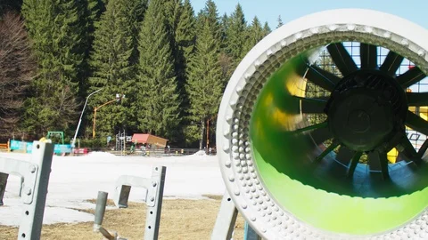 Snow machine in the spring. resting snow cannon. Shot on RED Raven Video stock 105747766