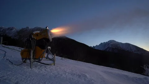 Snow making machine on piste at ski resort in snowy country. Stock Footage 146141595