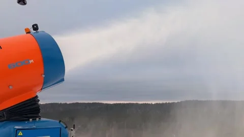 A snow making machine on the ski slope to prepare the ski resort. Stock Footage 335726368