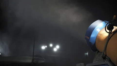 Snow making system in work at night. Snow cannon Stock-Footage 97283339