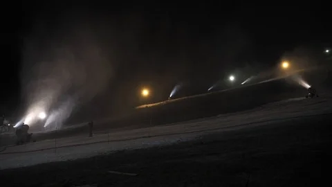 Snow making system in work at night. Snow cannon Vídeos de archivo 97796238