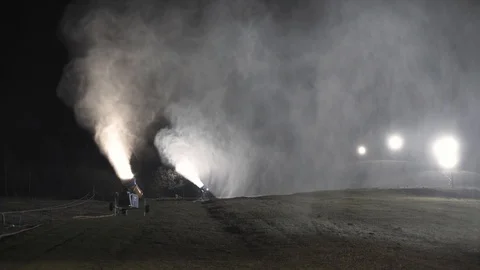 Snow making system in work. Several snow machines produce snow at night. Video stock 97283567