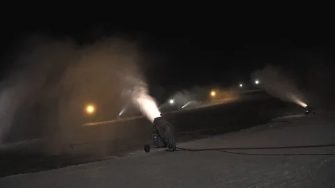 Snow making system in work. Several snow machines produce snow at night. 스톡 동영상 97795800