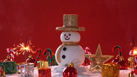 Snow man and gift box decoration on snow background. Stock Footage 94518286