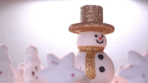 Snow man and gift box decoration on snow background. Stock Footage 94658477