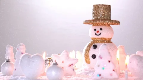 Snow man and gift box decoration on snow background. Stock Footage 94659151