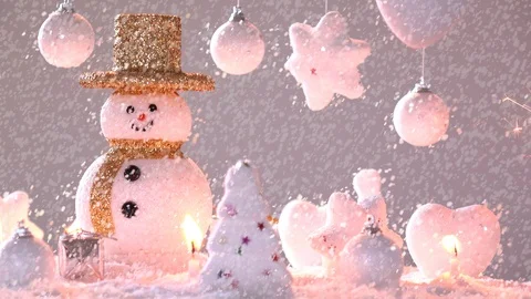 Snow man and gift box decoration on snow background. Stock Footage 94664699