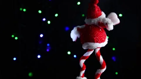 Snow man rotating on black background, Stock Footage 161578062