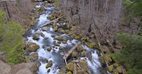 Snow melt flows from mountain Stock Footage 220932577