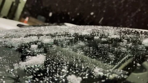 Snow Melting on Car Stock Footage 264638809