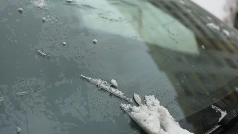 The snow is melting on the glass of the machine. Stock Footage 147040657