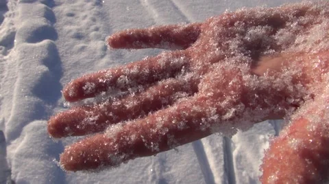 Snow melting on hand Video stock 40054312