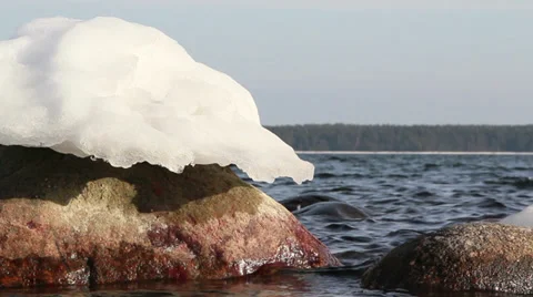 A snow melting on the rock Stock Footage 35120497