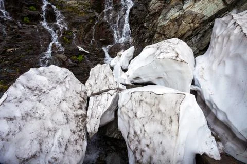 Snow melting on spring time Stock Photos