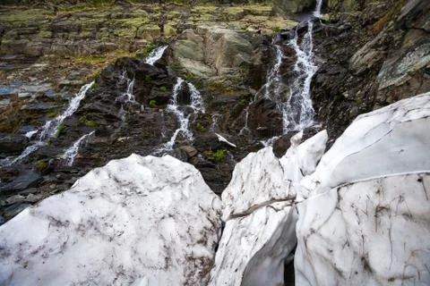 Snow melting on spring time Stock Photos