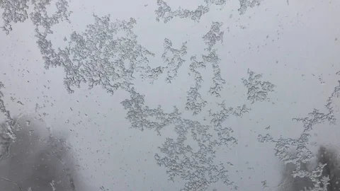 Snow melts and flows down Video stock 105441724