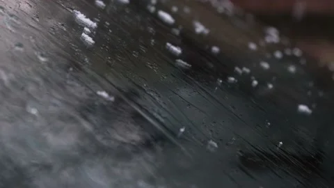 Snow melts on the car window. Stock Footage 168615722