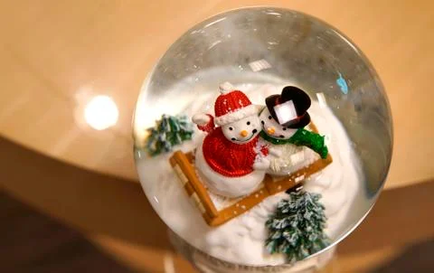 Snow men globe Stock Photos