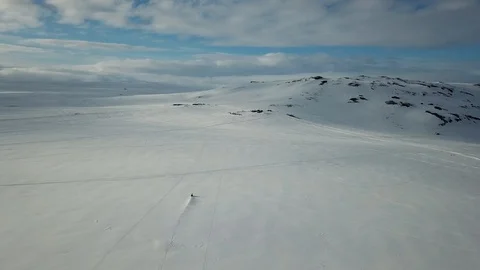 Snow mobile returning back to home base Stock Footage 95200212