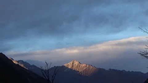 Snow mountain and beautiful clouds in the sunset Stock Footage 43982543