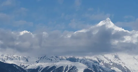 Snow mountain, cloudscape, daytime landscape (time-lapse) Stock Footage 132765294