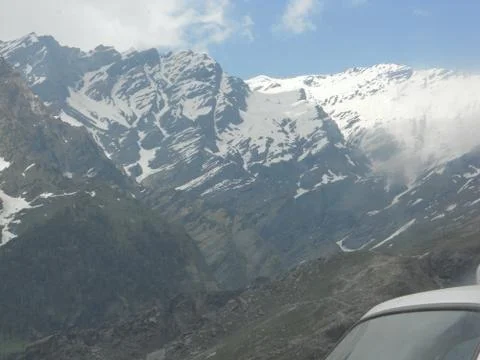 Snow mountain range during summer Stock Photos